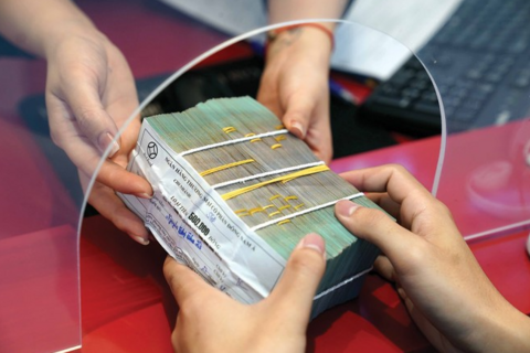 Lãi suất huy động nhích tăng trước “cơn khát vốn” cuối năm