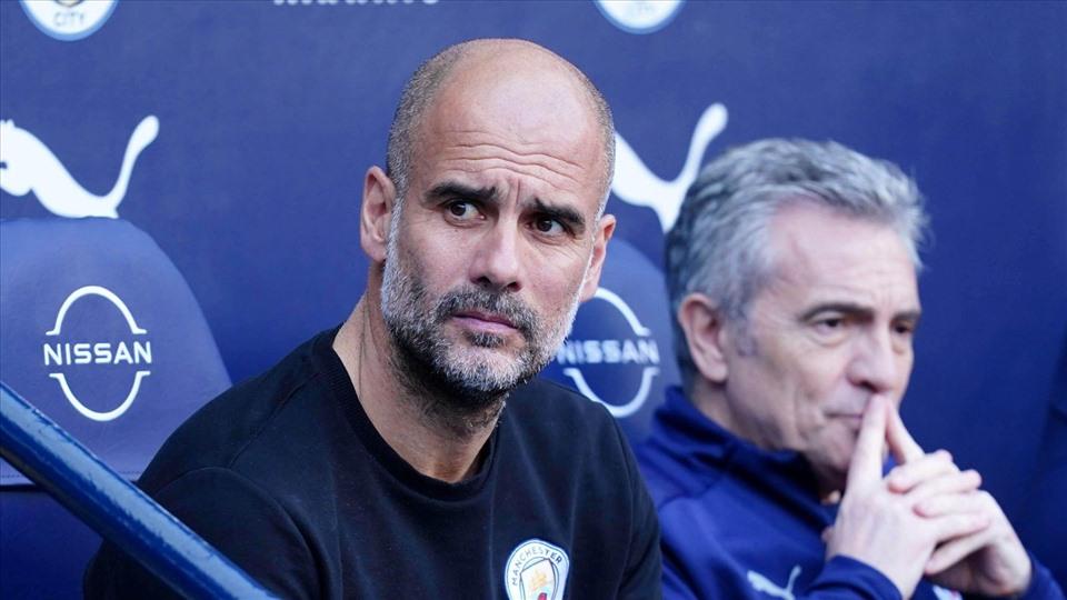 Pep Guardiola vẫn trầm ngâm nhưng đã đỡ buồn. Ảnh: AFP.