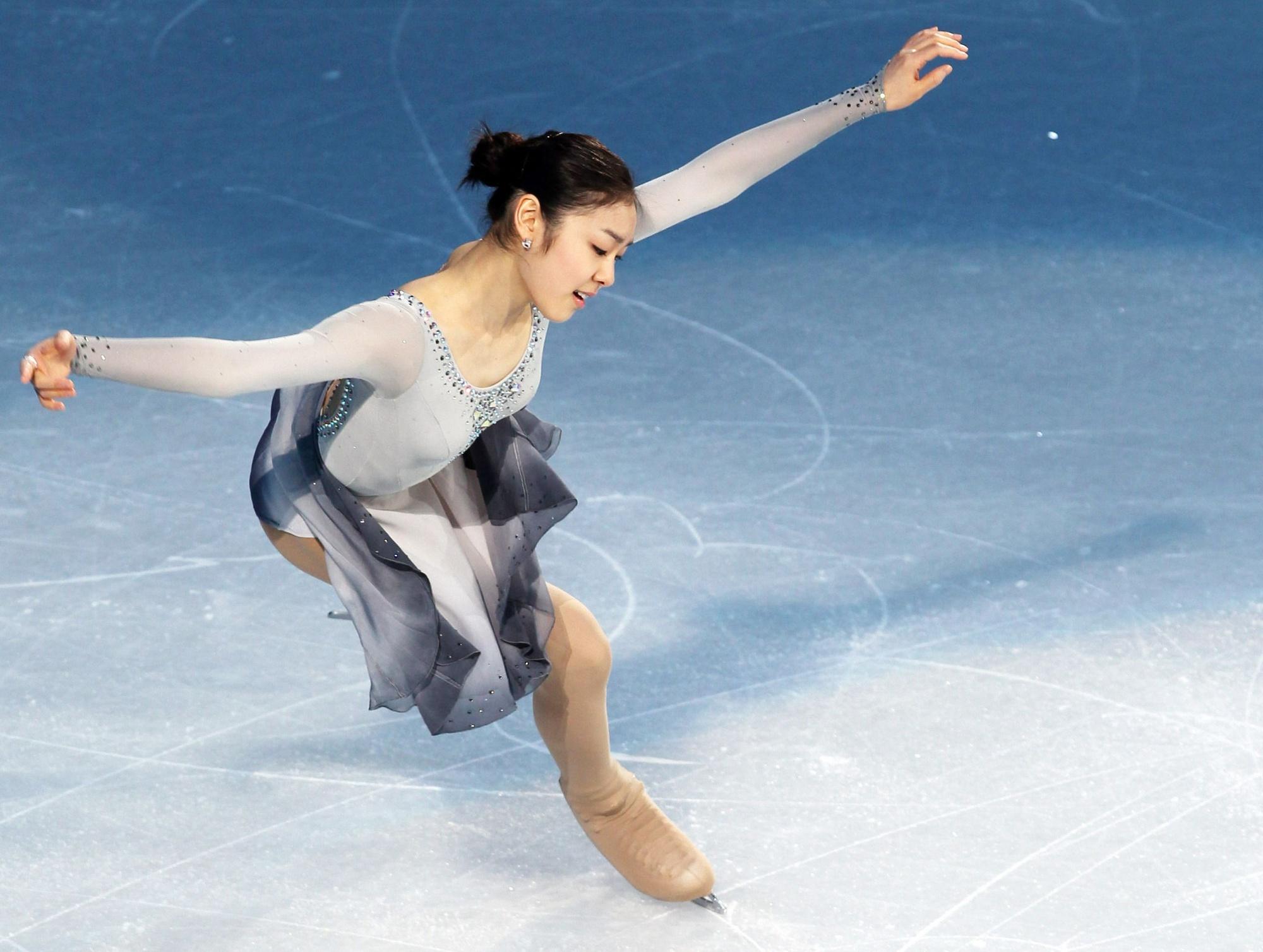 Phong cách nữ hoàng trượt băng Kim Yuna - Ảnh 2.