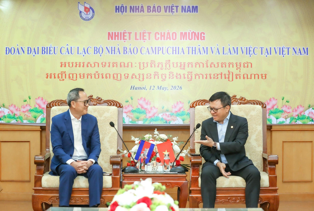chu-tich-hoi-nha-bao-viet-nam-le-quoc-minh-tiep-chu-tich-cau-lac-bo-nha-bao-campuchia-puy-kea-tai-buoi-lam-viec-o-ha-noi.jpg
